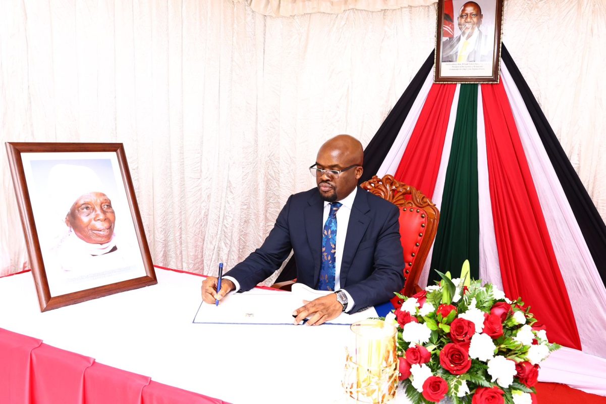 Signing the Condolence Book at Harambee House